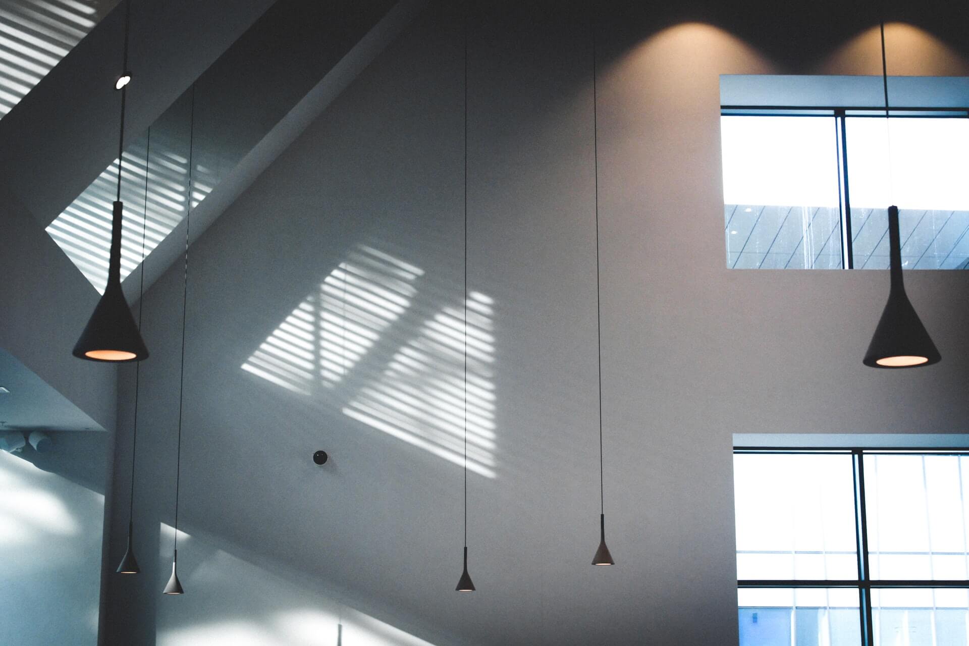 black-pendant-lamps-in-white-building-1381782.jpg